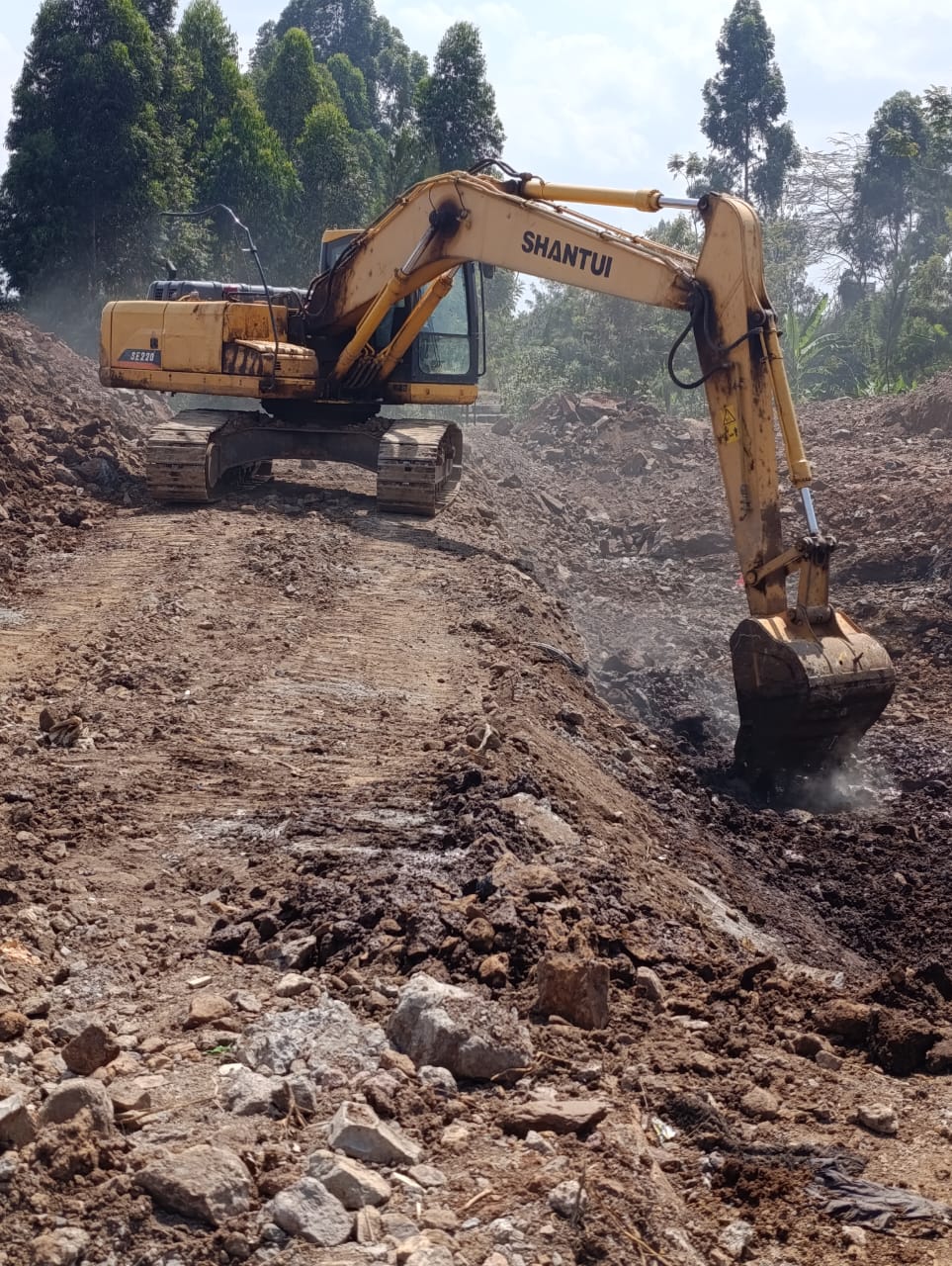 Kenyan construction workers following safety protocols